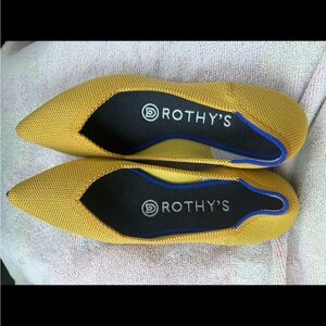 Rothy's Vibrant Yellow Flats with Blue Accent